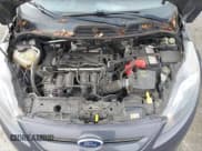 ✅ 2013 Ford Fiesta Titanium • VIN: 3FADP4FJ3DM208483 • Lot: 43900854. Wystawiony na IAAI z przebiegiem 178 774 mil. Bezpłatny archiwum sprzedaży aukcyjnych z USA i szczegółowy raport historii pojazdu na DreamBid. Zdjęcie 10.