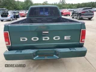 1993 Dodge Dakota z VIN 1B7FL23X3PS153914, wystawiony jako Copart lot #67756425 z przebiegiem 277 083 mil mil oraz Szkoda całkowita • Salvage title. Historia ofert i sprzedaży dostępna na DreamBid. Obrazek 6.