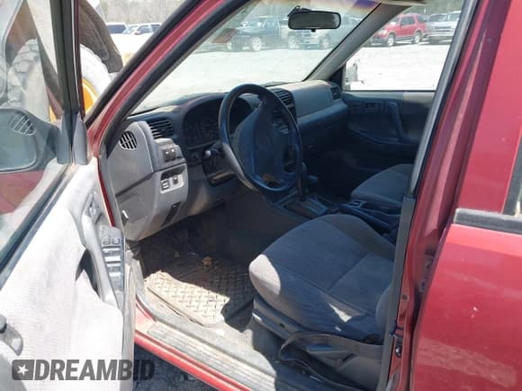 ✅ 1999 Isuzu Rodeo S • VIN: 4S2CM58W1X4356519 • Lot: 41693480. Listed on IAAI with 225,839 mi. Free auction sales archive from the USA and detailed vehicle history report at DreamBid. Image 5.