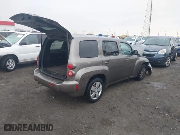 ✅ 2011 Chevrolet HHR LS • VIN: 3GNBAAFW5BS553088 • Lot: 41017260. Listed on IAAI with 159,026 mi. Free auction sales archive from the USA and detailed vehicle history report at DreamBid. Image 4.