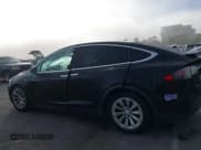 ✅ 2018 Tesla Model X 75D • VIN: 5YJXCDE2XJF137781 • Lot: 43834817. Listed on IAAI with 66,823 mi. Free auction sales archive from the USA and detailed vehicle history report at DreamBid. Image 13.