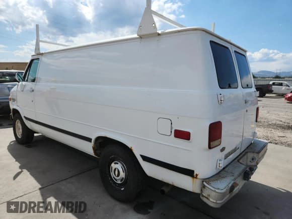 ✅ 1993 Chevrolet Chevy Van • VIN: 1GCEG25H3PF340021 • Lot: 69375045. Listed on Copart with 106,197 mi. Free auction sales archive from the USA and detailed vehicle history report at DreamBid. Image 2.