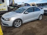 ✅ 2013 Volkswagen Jetta Hybrid SE • VIN: 3VW637AJ3DM299484 • Лот: 43634725. Опубликован ранее на Copart с пробегом 64 805 миль. Бесплатный доступ к архиву аукционных продаж из США и подробный отчёт об истории автомобиля на DreamBid. Изображение 1.