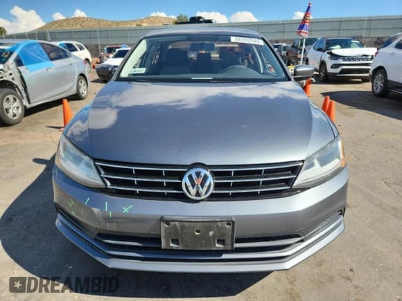 ✅ 2018 Volkswagen Jetta S • VIN: 3VW2B7AJ3JM232946 • Lot: 86692045. Listed on Copart with 68,504 mi. Free auction sales archive from the USA and detailed vehicle history report at DreamBid. Image 5.
