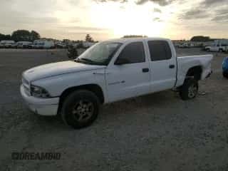 2002 Dodge Dakota SLT with VIN 1B7HL48X92S598972, listed as a Copart auction lot 79393614 with 228,582 mi miles and Salvage title. Bid and sale history available at DreamBid. Image 1.
