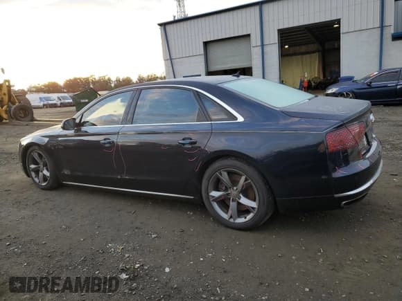 ✅ 2013 Audi A8 4.0L • VIN: WAUR2AFD8DN012310 • Lot: 87444785. Wystawiony na Copart z przebiegiem 223 320 mil. Bezpłatny archiwum sprzedaży aukcyjnych z USA i szczegółowy raport historii pojazdu na DreamBid. Zdjęcie 2.