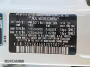 ✅ 2012 Hyundai Santa Fe Limited • VIN: 5XYZK4AG4CG110715 • Lot: 72454354. Listed on Copart with 64,514 mi. Free auction sales archive from the USA and detailed vehicle history report at DreamBid. Image 13.