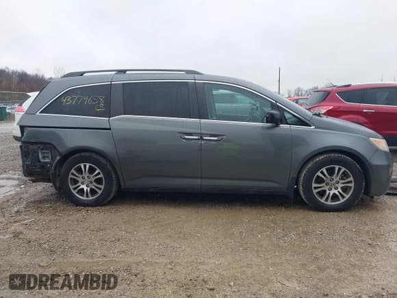 ✅ 2012 Honda Odyssey EX-L • VIN: 5FNRL5H63CB035402 • Lot: 43779658. Listed on IAAI with 170,420 mi. Free auction sales archive from the USA and detailed vehicle history report at DreamBid. Image 14.
