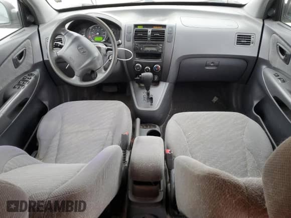 2005 Hyundai Tucson GL z VIN KM8JM12B75U146582, wystawiony jako Copart lot #82966094 z przebiegiem 132 445 mil mil oraz Nie do naprawy • Non repairable. Historia ofert i sprzedaży dostępna na DreamBid. Obrazek 8.