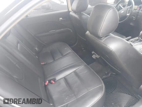 ✅ 2011 Ford Fusion Hybrid • VIN: 3FADP0L37BR171324 • Lot: 41775564. Listed on IAAI with 169,496 mi. Free auction sales archive from the USA and detailed vehicle history report at DreamBid. Image 8.