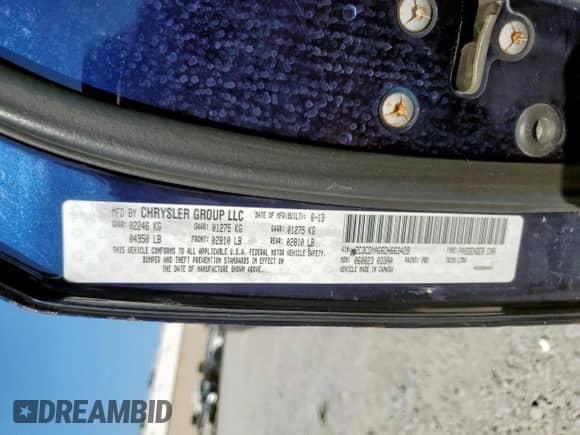 2013 Dodge Challenger SXT z VIN 2C3CDYAG6DH663428, wystawiony jako Copart lot #82074155 z przebiegiem 144 060 mil mil oraz Szkoda całkowita • Salvage title. Historia ofert i sprzedaży dostępna na DreamBid. Obrazek 12.