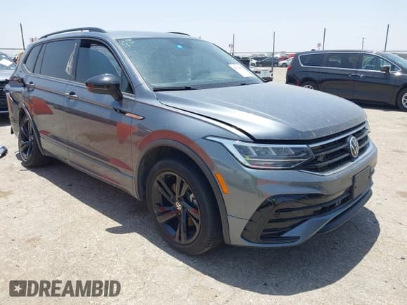 ✅ 2023 Volkswagen Tiguan SE R-Line Black • VIN: 3VVCB7AX7PM002428 • Лот: 42510090. Опубликован ранее на IAAI с пробегом 31 362 миль. Бесплатный доступ к архиву аукционных продаж из США и подробный отчёт об истории автомобиля на DreamBid. Изображение 1.