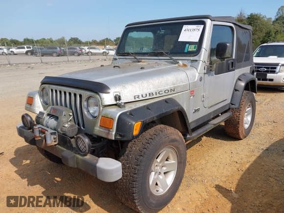✅ 2004 Jeep Wrangler Rubicon • VIN: 1J4FA69S74P758231 • Lot: 43113575. Wystawiony na IAAI z przebiegiem 75 048 mil. Bezpłatny archiwum sprzedaży aukcyjnych z USA i szczegółowy raport historii pojazdu na DreamBid. Zdjęcie 2.