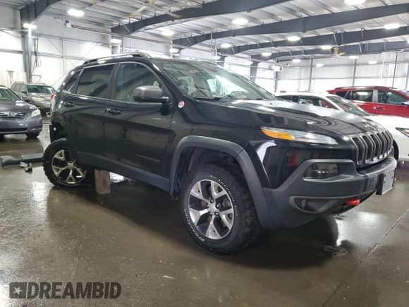 ✅ 2018 Jeep Cherokee Trailhawk • VIN: 1C4PJMBX0JD530976 • Lot: 87028435. Listed on Copart with 125,550 mi. Free auction sales archive from the USA and detailed vehicle history report at DreamBid. Image 4.