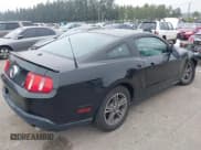 ✅ 2012 Ford Mustang Premium • VIN: 1ZVBP8AM5C5215026 • Lot: 43120364. Listed on IAAI with 104,396 mi. Free auction sales archive from the USA and detailed vehicle history report at DreamBid. Image 4.