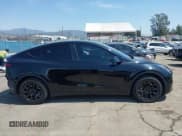 ✅ 2023 Tesla Model Y Long Range • VIN: 7SAYGDEE0PA023719 • Lot: 41974415. Listed on IAAI with 50,152 mi. Free auction sales archive from the USA and detailed vehicle history report at DreamBid. Image 14.