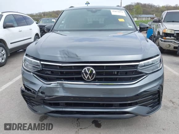 ✅ 2023 Volkswagen Tiguan SE R-Line Black • VIN: 3VVCB7AX5PM039767 • Lot: 42014072. Wystawiony na IAAI z przebiegiem 18 424 mil. Bezpłatny archiwum sprzedaży aukcyjnych z USA i szczegółowy raport historii pojazdu na DreamBid. Zdjęcie 13.