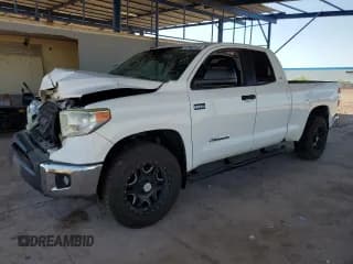 ✅ 2014 Toyota Tundra SR • VIN: 5TFUW5F13EX341291 • Lot: 62582045. Listed on Copart with 263,297 mi. Free auction sales archive from the USA and detailed vehicle history report at DreamBid. Image 1.