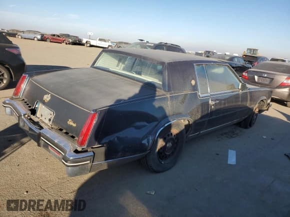 ✅ 1985 Cadillac Eldorado • VIN: 1G6EL5781FE655949 • Lot: 41961275. Listed on Copart with 4,479 mi. Free auction sales archive from the USA and detailed vehicle history report at DreamBid. Image 3.