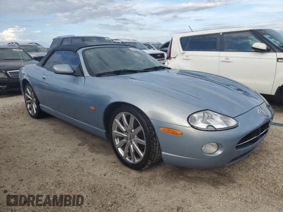 ✅ 2005 Jaguar XK XK8 • VIN: SAJDA42C152A44506 • Лот: 74444034. Опубликован ранее на Copart с пробегом Не указан. Бесплатный доступ к архиву аукционных продаж из США и подробный отчёт об истории автомобиля на DreamBid. Изображение 4.