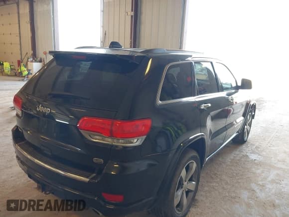 ✅ 2014 Jeep Grand Cherokee Overland • VIN: 1C4RJFCT1EC409613 • Lot: 43415659. Listed on IAAI with 173,712 mi. Free auction sales archive from the USA and detailed vehicle history report at DreamBid. Image 4.