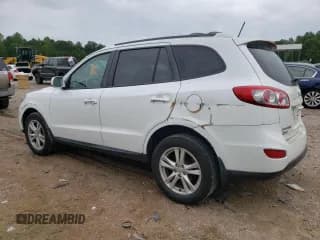 ✅ 2012 Hyundai Santa Fe Limited • VIN: 5XYZK4AG9CG138803 • Lot: 72385414. Listed on Copart with 140,718 mi. Free auction sales archive from the USA and detailed vehicle history report at DreamBid. Image 2.
