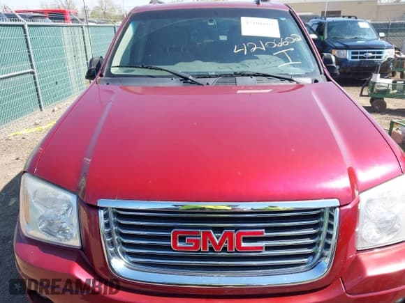✅ 2006 GMC Envoy SLT • VIN: 1GKDT13S662189377 • Lot: 42106602. Listed on IAAI with 156,391 mi. Free auction sales archive from the USA and detailed vehicle history report at DreamBid. Image 6.