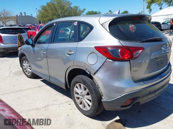 ✅ 2015 Mazda CX-5 Sport • VIN: JM3KE2BEXF0527431 • Lot: 41832024. Listed on IAAI with 131,215 mi. Free auction sales archive from the USA and detailed vehicle history report at DreamBid. Image 3.