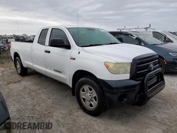 ✅ 2010 Toyota Tundra SR • VIN: 5TFTY5F15AX006775 • Lot: 76084304. Listed on Copart with 206,213 mi. Free auction sales archive from the USA and detailed vehicle history report at DreamBid. Image 4.
