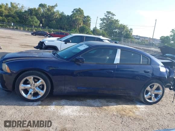 2014 Dodge Charger SXT Plus with VIN 2C3CDXHG5EH254435, listed as a IAAI auction lot 42178122 with 120,622 mi miles and . Bid and sale history available at DreamBid. Image 14.