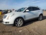 ✅ 2014 Cadillac SRX Performance Collection • VIN: 3GYFNFE32ES579763 • Lot: 65644415. Wystawiony na Copart z przebiegiem 110 223 mil. Bezpłatny archiwum sprzedaży aukcyjnych z USA i szczegółowy raport historii pojazdu na DreamBid. Zdjęcie 1.