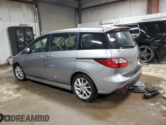 ✅ 2012 Mazda 5 Grand Touring • VIN: JM1CW2DL5C0143414 • Lot: 92329075. Listed on Copart with 107,084 mi. Free auction sales archive from the USA and detailed vehicle history report at DreamBid. Image 2.