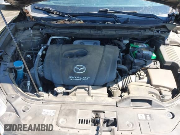 ✅ 2014 Mazda CX-5 Grand Touring • VIN: JM3KE2DY3E0339601 • Lot: 42652114. Wystawiony na IAAI z przebiegiem 153 063 mil. Bezpłatny archiwum sprzedaży aukcyjnych z USA i szczegółowy raport historii pojazdu na DreamBid. Zdjęcie 10.