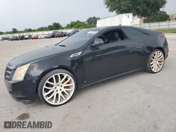 ✅ 2012 Cadillac CTS • VIN: 1G6DA1E37C0142277 • Lot: 68264685. Listed on Copart with 123,903 mi. Free auction sales archive from the USA and detailed vehicle history report at DreamBid. Image 1.