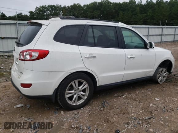 ✅ 2012 Hyundai Santa Fe Limited • VIN: 5XYZK4AG9CG138803 • Lot: 72385414. Listed on Copart with 140,718 mi. Free auction sales archive from the USA and detailed vehicle history report at DreamBid. Image 3.