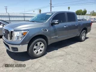 ✅ 2017 Nissan Titan SV • VIN: 1N6AA1EJ2HN521497 • Lot: 56995305. Listed on Copart with 154,637 mi. Free auction sales archive from the USA and detailed vehicle history report at DreamBid. Image 1.