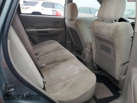 2005 Hyundai Tucson GLS z VIN KM8JN72DX5U214908, wystawiony jako Copart lot #76346024 z przebiegiem 152 677 mil mil oraz Szkoda całkowita • Salvage title. Historia ofert i sprzedaży dostępna na DreamBid. Obrazek 10.