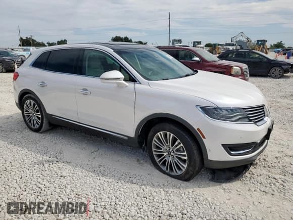 ✅ 2016 Lincoln MKX Reserve • VIN: 2LMPJ6LR6GBL63453 • Lot: 84600455. Listed on Copart with 30,646 mi. Free auction sales archive from the USA and detailed vehicle history report at DreamBid. Image 4.