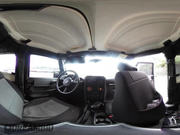 ✅ 2007 Jeep Wrangler Rubicon • VIN: 1J4GA64117L149666 • Lot: 42252464. Listed on IAAI with 100,791 mi. Free auction sales archive from the USA and detailed vehicle history report at DreamBid. Image 19.