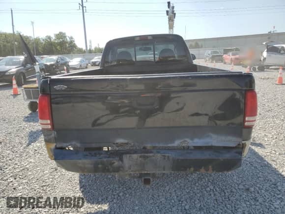 2000 Dodge Dakota Sport z VIN 1B7GG26N7YS667611, wystawiony jako Copart lot #71181355 z przebiegiem 218 471 mil mil oraz Szkoda całkowita • Salvage title. Historia ofert i sprzedaży dostępna na DreamBid. Obrazek 6.