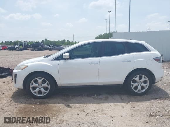 ✅ 2010 Mazda CX-7 Touring • VIN: JM3ER2W34A0308158 • Lot: 42641438. Wystawiony na IAAI z przebiegiem 117 800 mil. Bezpłatny archiwum sprzedaży aukcyjnych z USA i szczegółowy raport historii pojazdu na DreamBid. Zdjęcie 14.