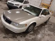 ✅ 2002 Cadillac Seville Touring STS • VIN: 1G6KY54942U137349 • Lot: 41991979. Wystawiony na IAAI z przebiegiem 143 169 mil. Bezpłatny archiwum sprzedaży aukcyjnych z USA i szczegółowy raport historii pojazdu na DreamBid. Zdjęcie 2.