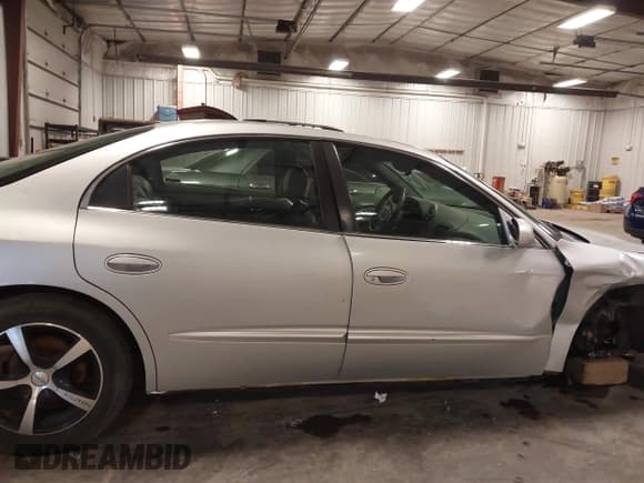 ✅ 2001 Oldsmobile Aurora • VIN: 1G3GS64C214111868 • Lot: 41721992. Listed on IAAI with 146,785 mi. Free auction sales archive from the USA and detailed vehicle history report at DreamBid. Image 19.