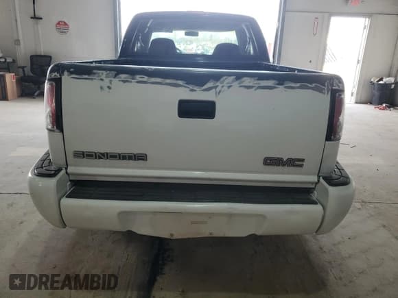 ✅ 1999 GMC Sonoma SLS • VIN: 1GTCS19XXX8503933 • Lot: 48311685. Listed on Copart with Not provided. Free auction sales archive from the USA and detailed vehicle history report at DreamBid. Image 6.