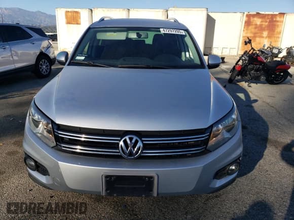 ✅ 2012 Volkswagen Tiguan LE • VIN: WVGAV7AX2CW580035 • Lot: 47297205. Listed on Copart with 118,211 mi. Free auction sales archive from the USA and detailed vehicle history report at DreamBid. Image 5.