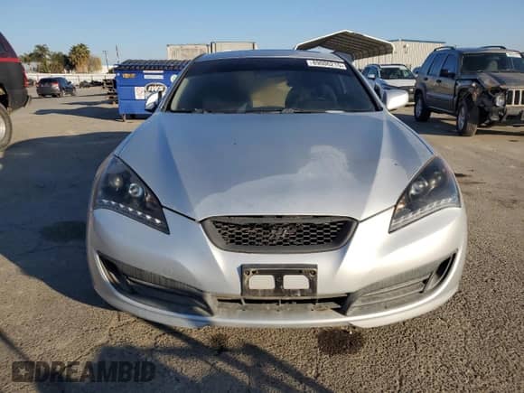 2010 Hyundai Genesis Coupe Premium z VIN KMHHT6KD0AU004424, wystawiony jako Copart lot #89006215 z przebiegiem 128 992 mil mil oraz Szkoda całkowita • Salvage title. Historia ofert i sprzedaży dostępna na DreamBid. Obrazek 5.