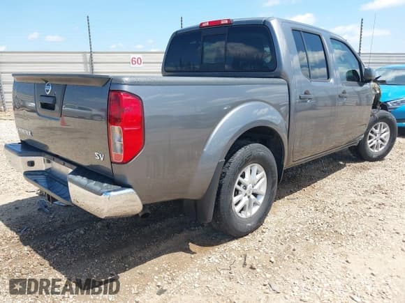 ✅ 2021 Nissan Frontier SV • VIN: 1N6ED0EA0MN710260 • Lot: 42292937. Listed on IAAI with 63,573 mi. Free auction sales archive from the USA and detailed vehicle history report at DreamBid. Image 4.