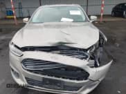 ✅ 2015 Ford Fusion SE Hybrid • VIN: 3FA6P0LU4FR199170 • Лот: 43693803. Опубликован ранее на IAAI с пробегом 180 099 миль. Бесплатный доступ к архиву аукционных продаж из США и подробный отчёт об истории автомобиля на DreamBid. Изображение 6.