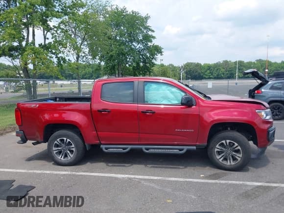 ✅ 2021 Chevrolet Colorado 4WD Z71 • VIN: 1GCGTDEN9M1109865 • Lot: 42607584. Wystawiony na IAAI z przebiegiem 48 808 mil. Bezpłatny archiwum sprzedaży aukcyjnych z USA i szczegółowy raport historii pojazdu na DreamBid. Zdjęcie 13.