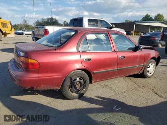 ✅ 2000 Chevrolet Prizm • VIN: 1Y1SK5483YZ404526 • Lot: 80197555. Listed on Copart with 123,731 mi. Free auction sales archive from the USA and detailed vehicle history report at DreamBid. Image 3.
